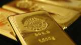 Gold prices drop to six-month low on strong dollar, U.S. rate outlook